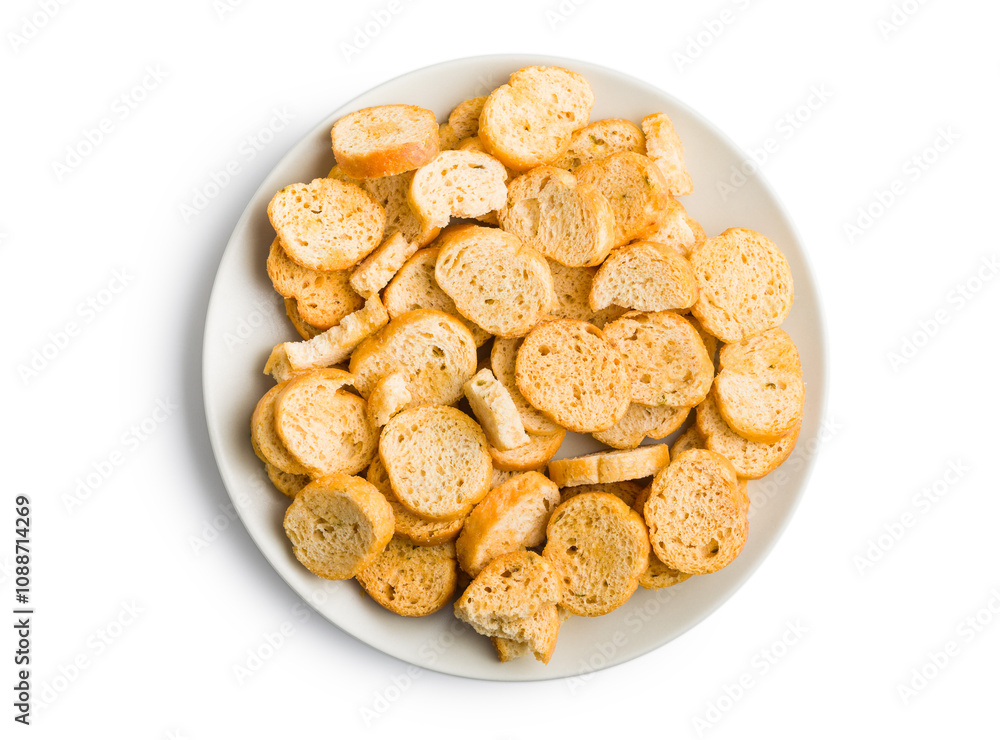 Sliced roasted bruschetta bread on plate isolated on white background. Sliced roasted bruschetta bread on plate isolated on white background.