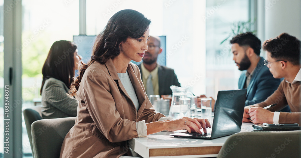 © peopleimages.com - Business woman, laptop and research in meeting with project administration, proposal and planning in office. Manager, tech and diversity with typing report for discussion, feedback and communication