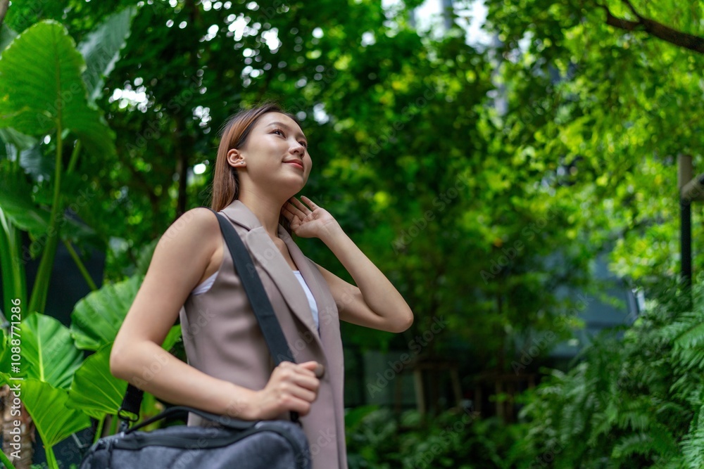 Portrait of a Young Businesswoman Amid Greenery and Tree in A Public Park Portrait of a Young Businesswoman Amid Greenery and Tree in A Public Park