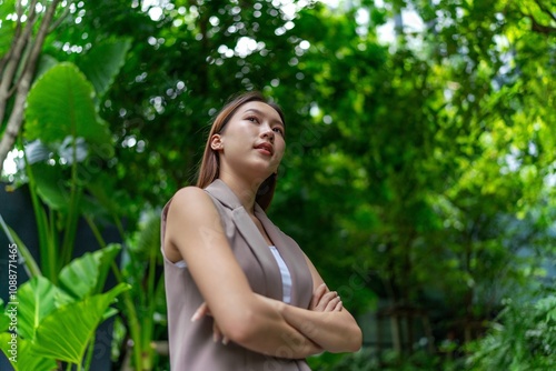 Portrait of a Young Businesswoman Amid Greenery and Tree in A Public Park