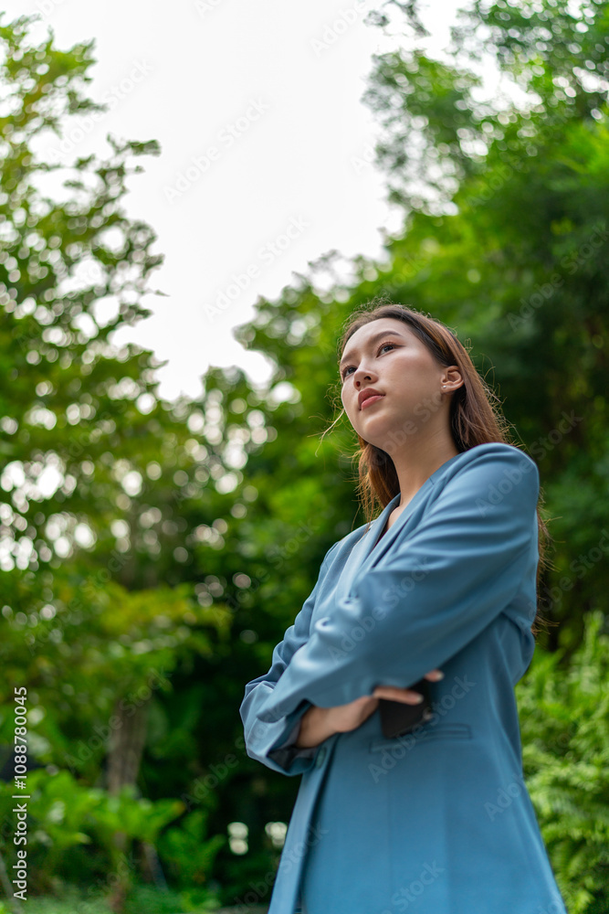 Portrait of a Young Businesswoman Amid Greenery and Tree in A Public Park Portrait of a Young Businesswoman Amid Greenery and Tree in A Public Park