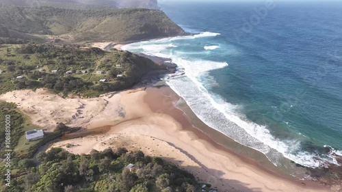 Burning Palms Beach drone flight along the escarpment and empty coastline, Royal National Park, NSW Australia