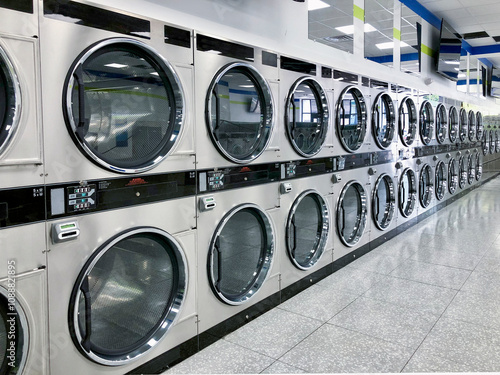 фотографія Commercial laundry, washing clothes dryers