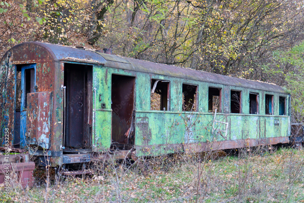 Abandoned diesel locomotive with cars.old , rusty train stands in an abandoned station. High quality photo Abandoned diesel locomotive with cars.old , rusty train stands in an abandoned station. High quality photo