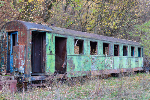 Abandoned diesel locomotive with cars.old , rusty train stands in an abandoned station. High quality photo