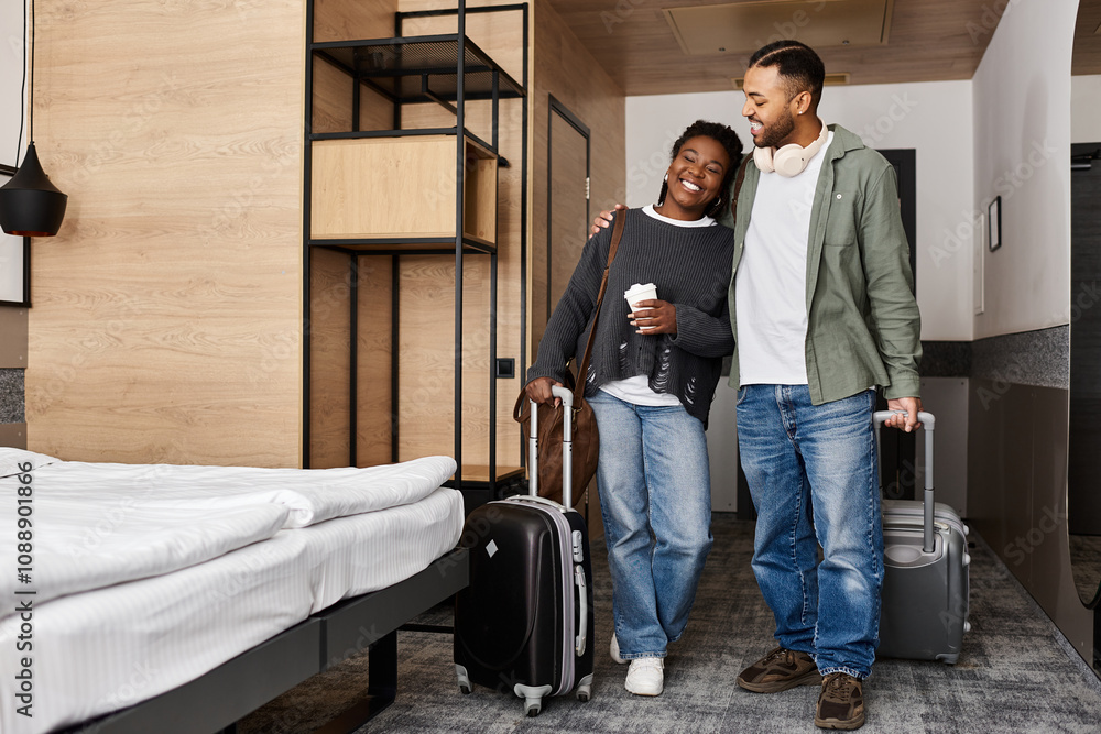 A joyful young couple shares a moment of love and relaxation in their trendy hotel room during vacation. A joyful young couple shares a moment of love and relaxation in their trendy hotel room during vacation.