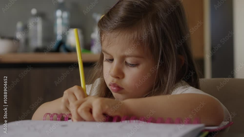 A Focused Child Engaged in a Creative Learning Activity that Sparks Imagination and Joy A Focused Child Engaged in a Creative Learning Activity that Sparks Imagination and Joy