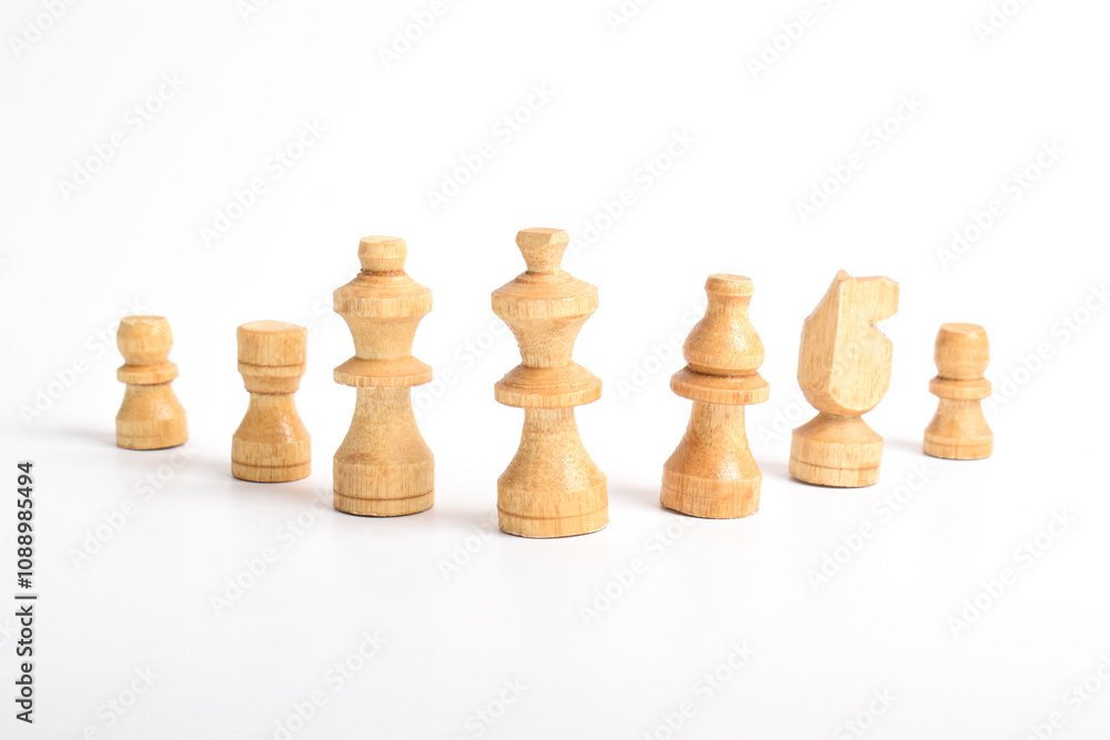 Wooden Chess set isolated on white backgound, chess piece king, queen, bishop, knight horse, rook, pawn. Business, Competition, Strategy, Decision concept Wooden Chess set isolated on white backgound, chess piece king, queen, bishop, knight horse, rook, pawn. Business, Competition, Strategy, Decision concept