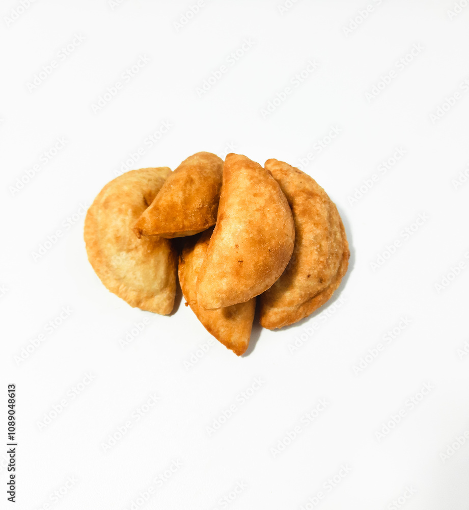 Cireng filled with shredded chicken. It tastes spicy and delicious with a white background Cireng filled with shredded chicken. It tastes spicy and delicious with a white background