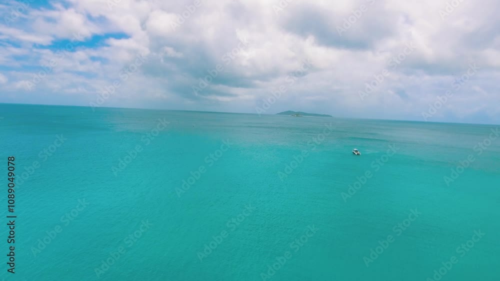 Praslin Beach, Seychelles. Aerial view of tropical coastline on a sunny day Praslin Beach, Seychelles. Aerial view of tropical coastline on a sunny day