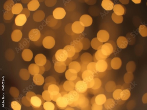 Abstract background with bokeh unfocused gold and gray lights, foggy atmosphere, bokeh effect, blurred highlights