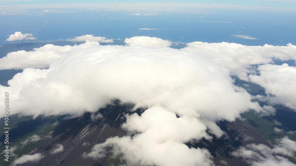 Aerial panorama of Grande Soufri?re volcano's summit, shrouded in thick clouds and mist, with a stunning view of the surrounding landscape and a sea in the distance, volcano, guadeloupe, geography Aerial panorama of Grande Soufri?re volcano's summit, shrouded in thick clouds and mist, with a stunning view of the surrounding landscape and a sea in the distance, volcano, guadeloupe, geography