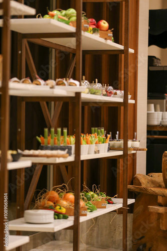 A minimalist and modern buffet display featuring fresh, colorful fruits and vegetables, perfect for a healthy and stylish event