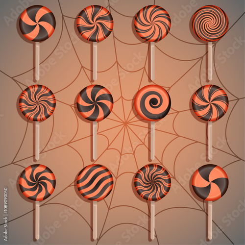 Orange and black lollypops on light grey background with spiderweb. Helloween lollypops.