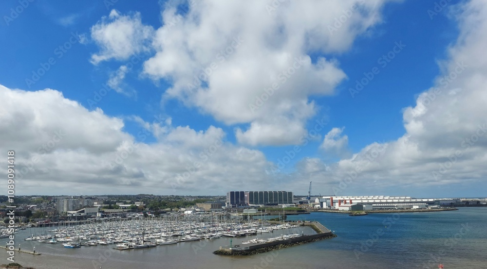 france quai de francemay 2 2024 A picturesque view of a bustling marina filled with numerous boats, set against a backdrop of fluffy clouds and a bright blue sky. france quai de francemay 2 2024 A picturesque view of a bustling marina filled with numerous boats, set against a backdrop of fluffy clouds and a bright blue sky.
