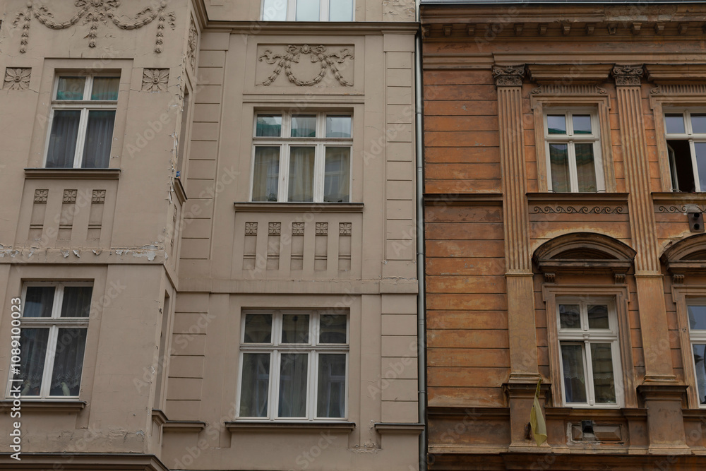 This image presents a sidebyside comparison of both modern and classic architectural facades, effectively showcasing their distinct styles, unique materials, and contrasting designs This image presents a sidebyside comparison of both modern and classic architectural facades, effectively showcasing their distinct styles, unique materials, and contrasting designs