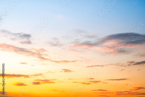 like a bright golden and blue sky. The sunrise is decorated with clouds in various shapes, everning,Twilight, Large size, High definition landscape photo