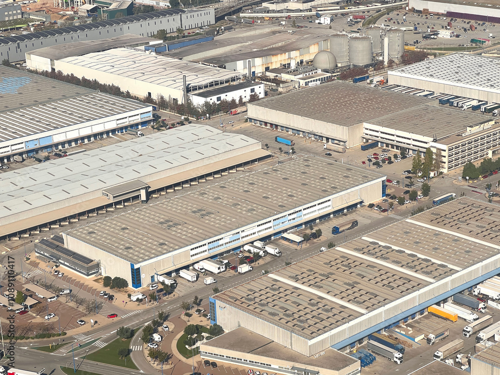 Panoramic view of the port in Barcelona, one of the busiest container port in Europe. Barcelona Harbor, Spain. Aerial view of a car parking Panoramic view of the port in Barcelona, one of the busiest container port in Europe. Barcelona Harbor, Spain. Aerial view of a car parking