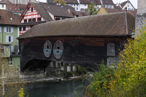 View at the wooden bridge of Baden on Switzerland photo