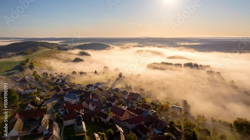 The village near castle Leuchtenburg in east Germany in the morning. Sunrise in late October 