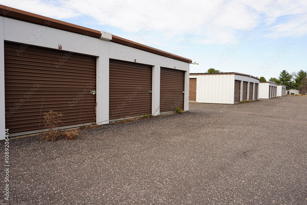 White and Brown storage units holding the owner's property. White and Brown storage units holding the owner's property.