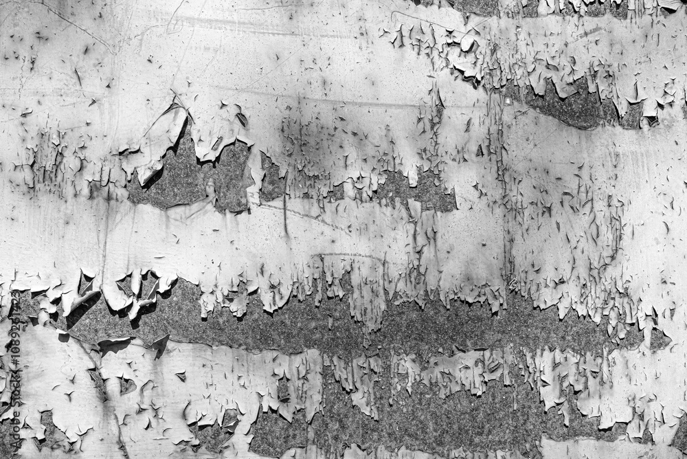 Old peeling paint on the wall as an abstract background.