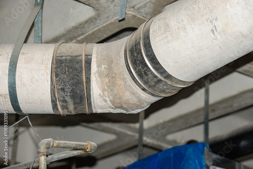 Asbestos transite pipe use for gas  line in buildingd photo