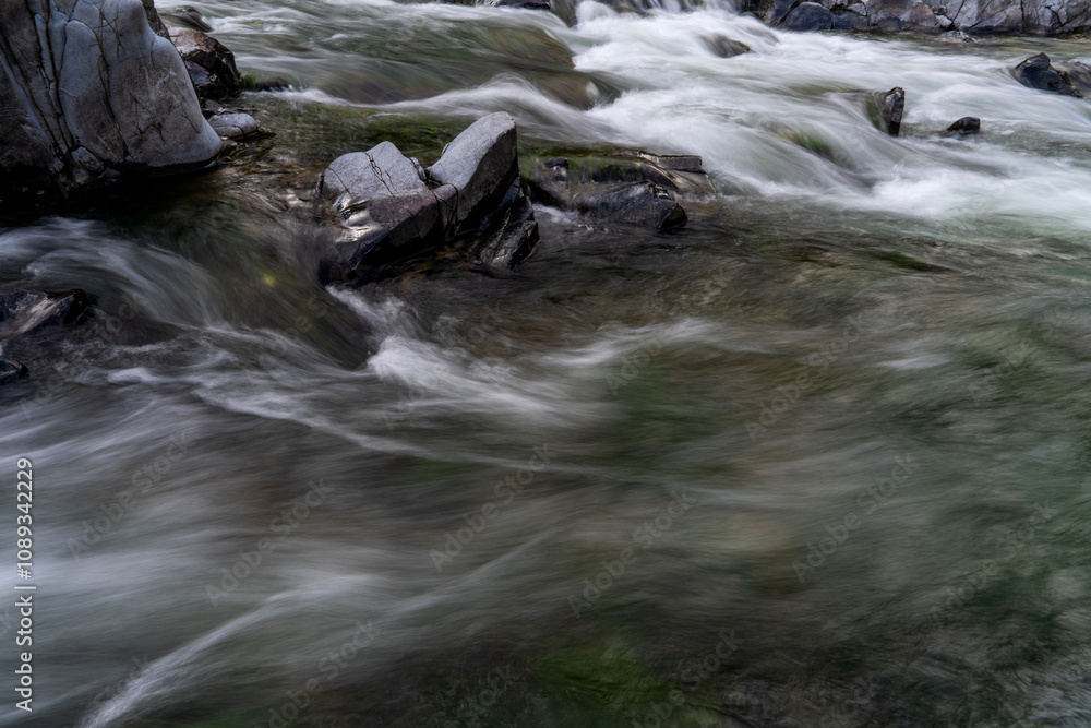flowing water at the stream in the autumn valley flowing water at the stream in the autumn valley