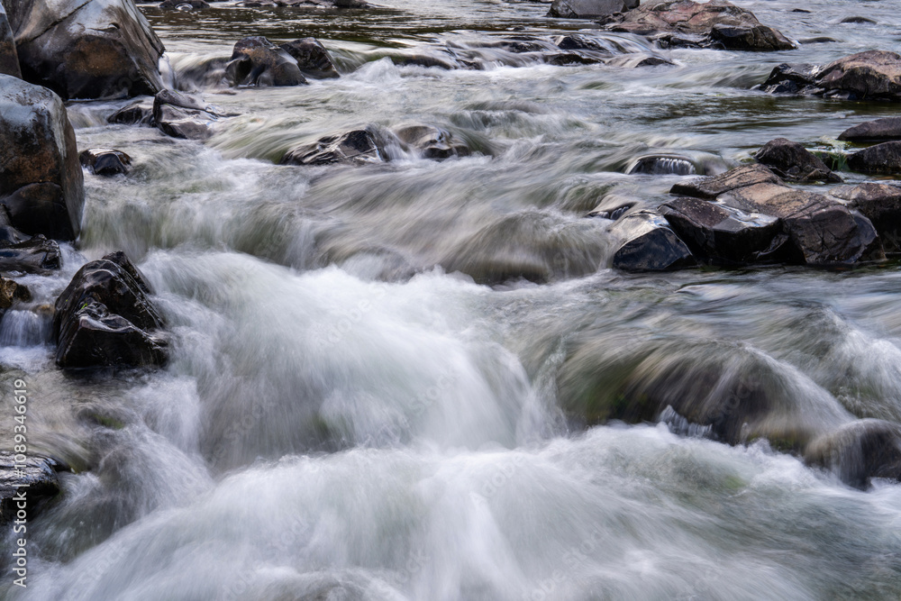 flowing water at the stream in the autumn valley flowing water at the stream in the autumn valley
