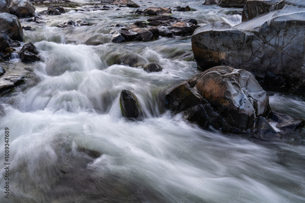 flowing water at the stream in the autumn valley flowing water at the stream in the autumn valley