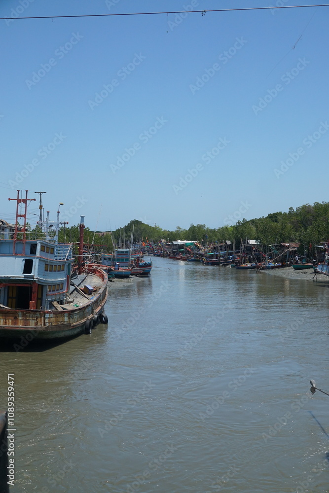 Fishing boats on a serene river coastal village landscape photography tranquil environment wide view natural beauty Fishing boats on a serene river coastal village landscape photography tranquil environment wide view natural beauty