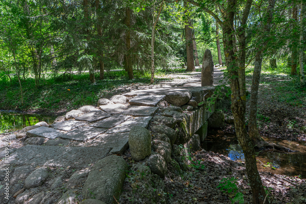 Rustic Stone Bridge in the Finnish Forest of Rascafría Rustic Stone Bridge in the Finnish Forest of Rascafría
