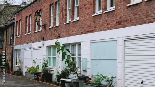 old house at Ladbroke Mews, Notting Hill cul-de-sac, Royal Borough of Kensington and Chelsea, West London photo