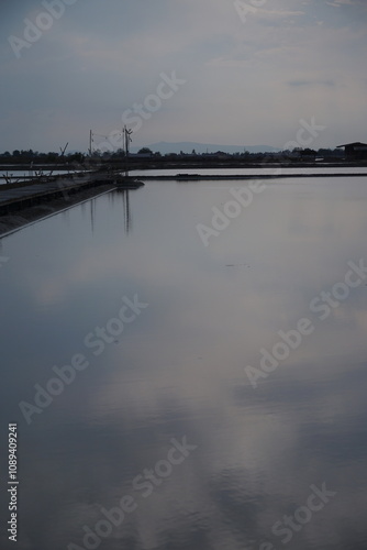 Calm reflections on a serene waterbody rural landscape nature photography tranquil environment wide viewpoint peaceful concept