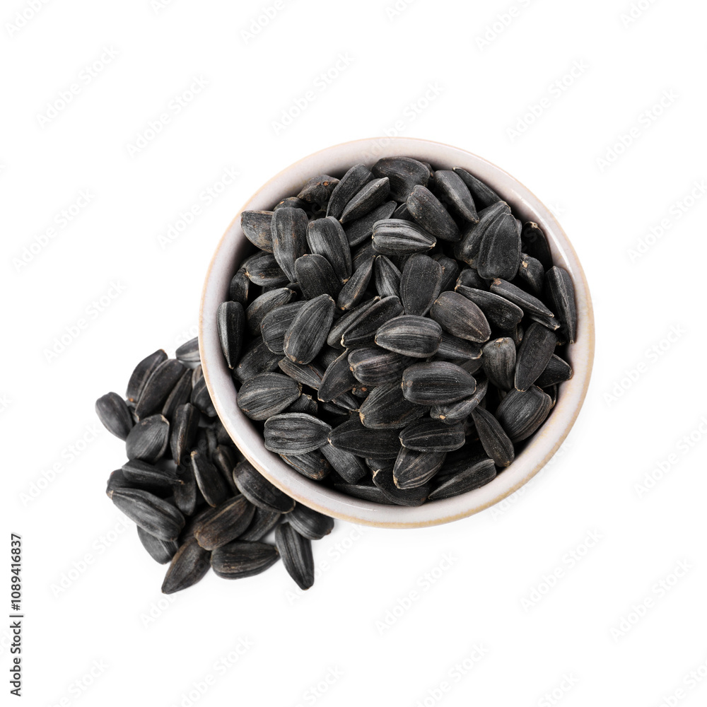 Sunflower seeds in bowl isolated on white, top view Sunflower seeds in bowl isolated on white, top view