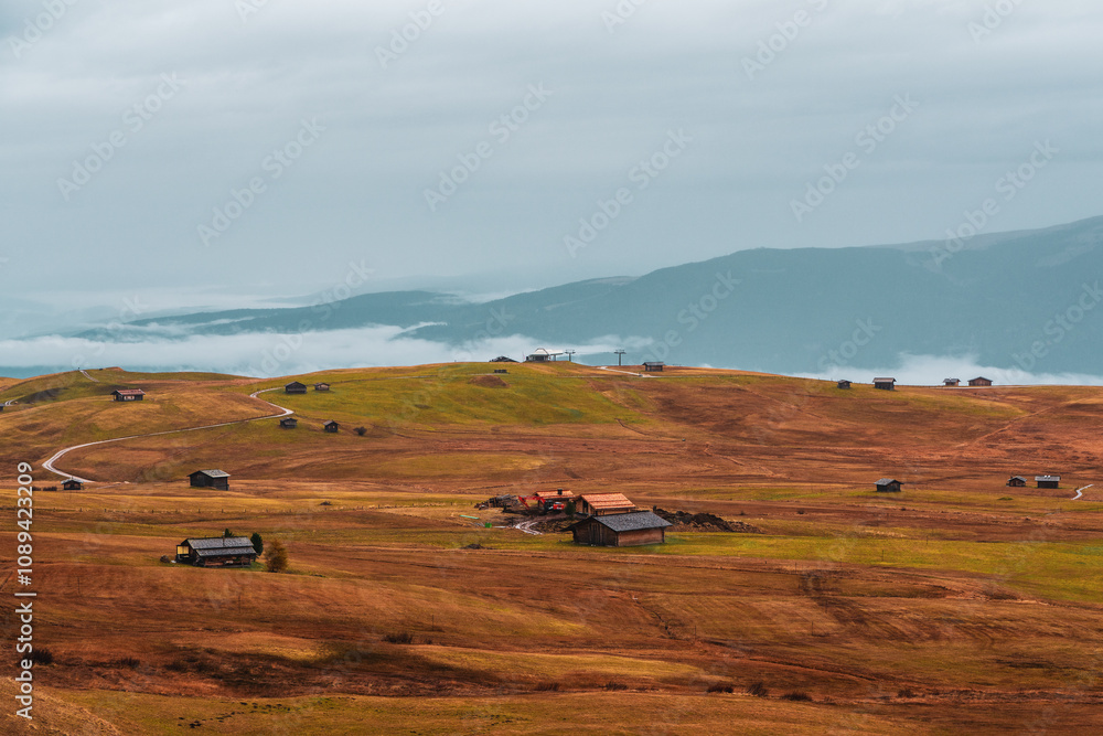 Obraz premium Morning mist over Seiser Alm in the Dolomites, Italy.
