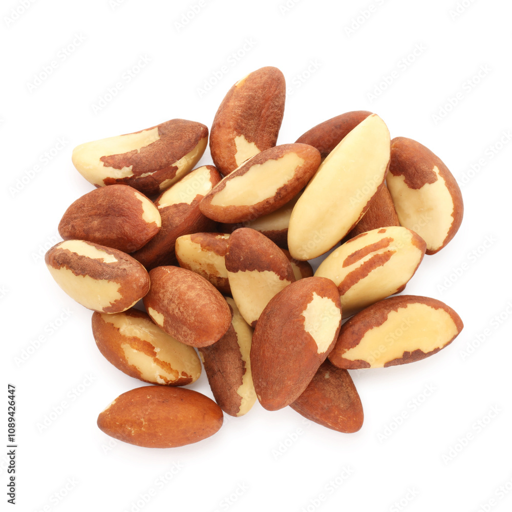 Heap of Brazil nuts isolated on white, top view Heap of Brazil nuts isolated on white, top view