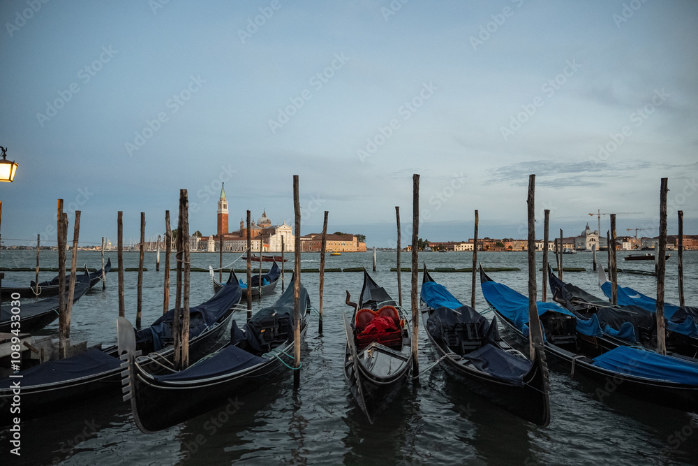 Night view of gondolas, canals and old town background Italy, Venice. Night view of gondolas, canals and old town background Italy, Venice.