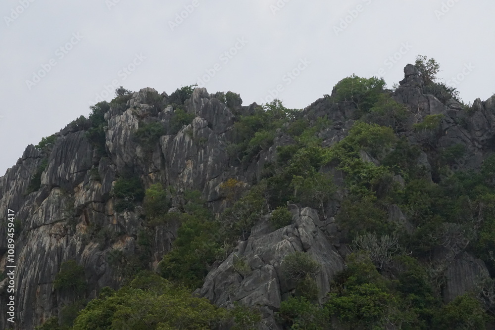 Exploring rocky outcrops mountain range nature photography overcast sky elevated viewpoint wilderness adventure Exploring rocky outcrops mountain range nature photography overcast sky elevated viewpoint wilderness adventure