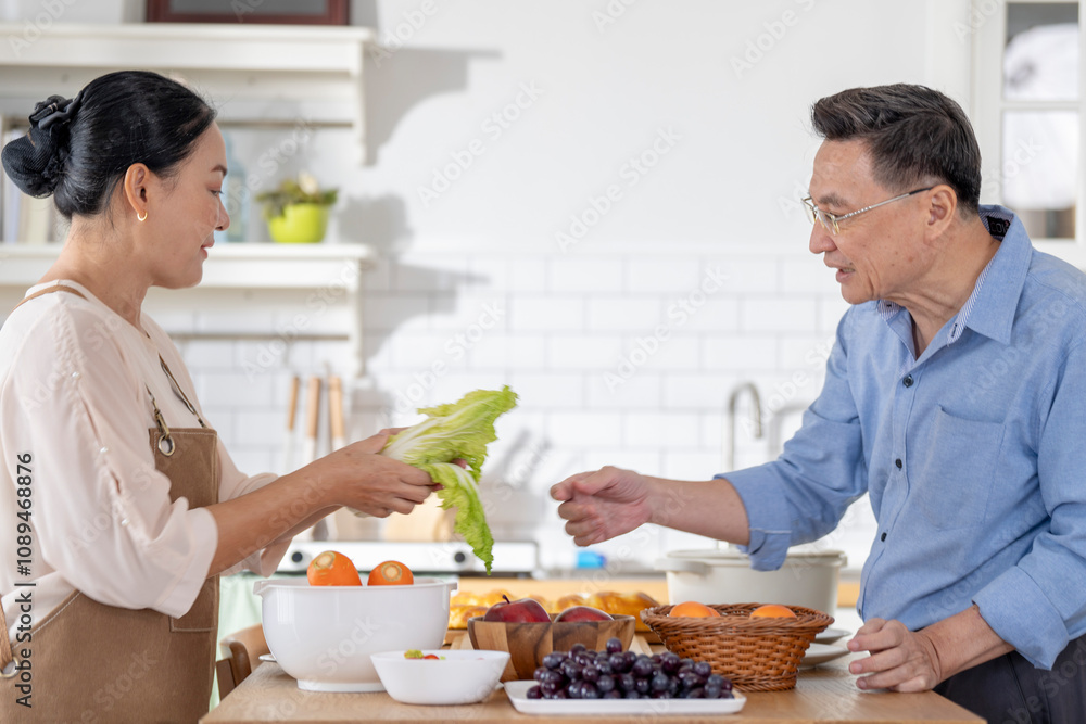 A woman prepares fresh vegetables in a cozy kitchen, while a man assists in the background. The scene emphasizes a warm and healthy lifestyle with a focus on fresh produce and home cooking. A woman prepares fresh vegetables in a cozy kitchen, while a man assists in the background. The scene emphasizes a warm and healthy lifestyle with a focus on fresh produce and home cooking.