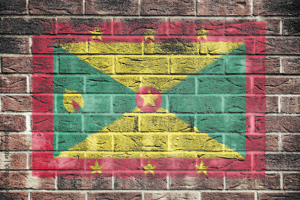 Fototapeta premium Grenada flag on brick wall