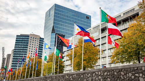 Flag parade, Rotterdam, Netherlands, Highrise buildings and cloudy sky