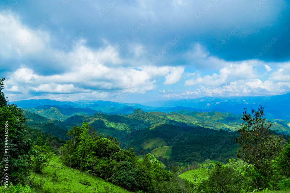 Fototapeta premium Breathtaking mountain landscape lush green valleys nature photography scenic view tranquil environment captivating wilderness