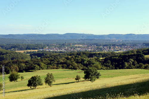 Aussicht ins Nordpfälzer Bergland und Weilerbach vom kleinen Ort Eulenbis in der Verbandsgemeinde Weilerbach im Landkreis Kaiserslautern. Aussicht vom Premium-Wanderweg Teufelstour.  photo