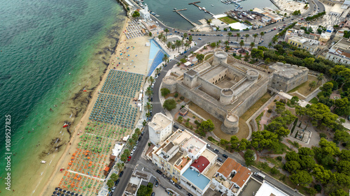 Aerial view of the castle of Manfredonia, in Puglia, Italy. It is a military structure built by the Aragonese and expanded in the eras of Swabian and Angevin domination. In background is Adriatic sea. photo