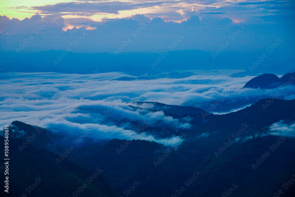 Fototapeta premium Breathtaking sunrise over misty mountains nature landscape scenic view serene environment majestic concept