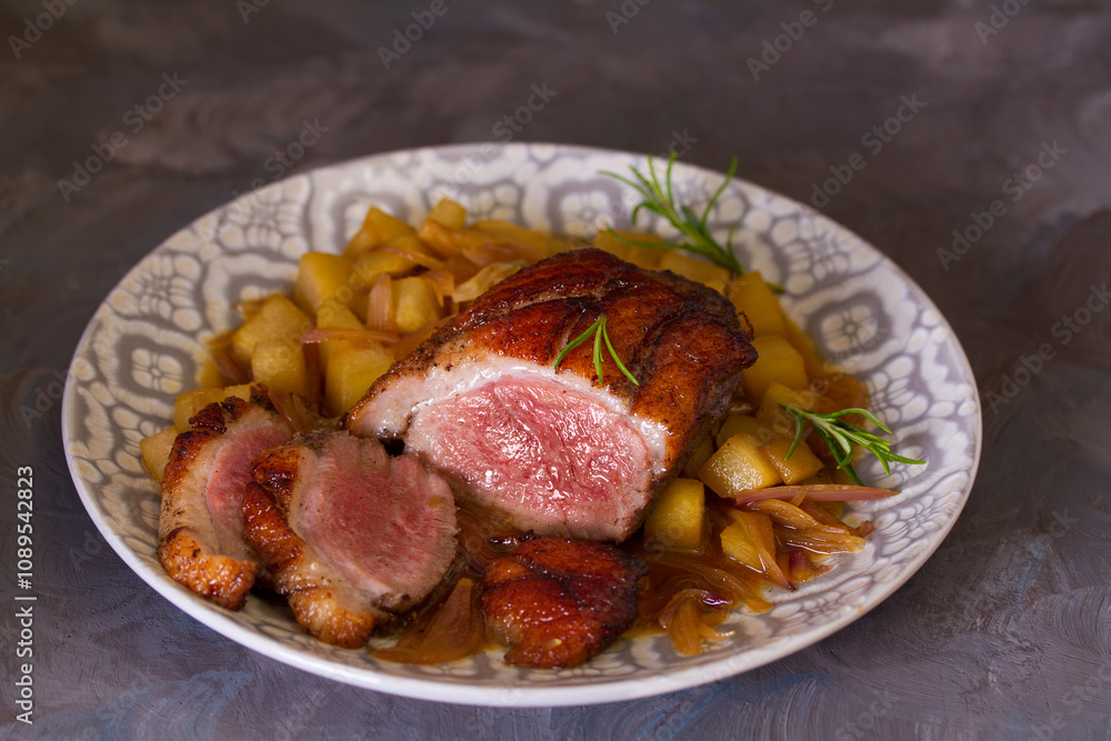 Duck breast fillets with pears and rosemary Duck breast fillets with pears and rosemary