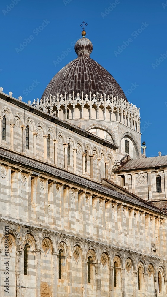 Fototapeta premium The famous architecture in Pisa city. Piazza del Duomo, Battistero di San Giovanni, Leaning Tower, Cattedrale di Pisa