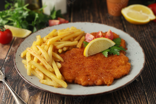 Photography A Viennese schizel with french fries
