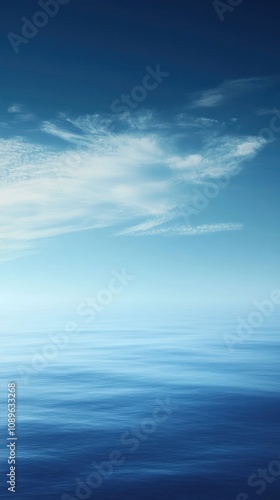 Serene Ocean Scene Under A Blue Sky With Clouds